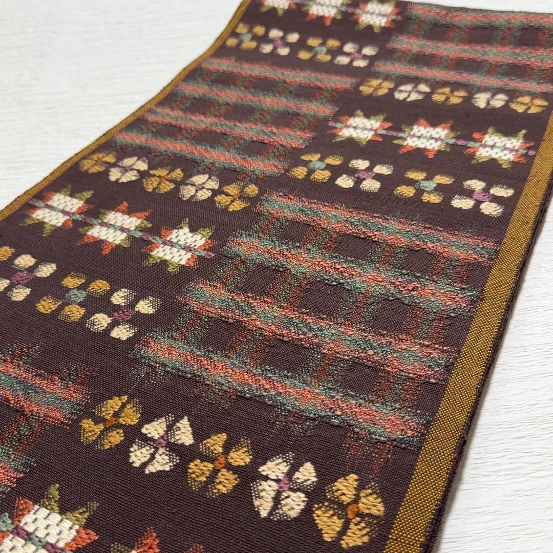 帯屋捨松 謹製 \"スウェーデン裂文\" 名古屋帯 正絹