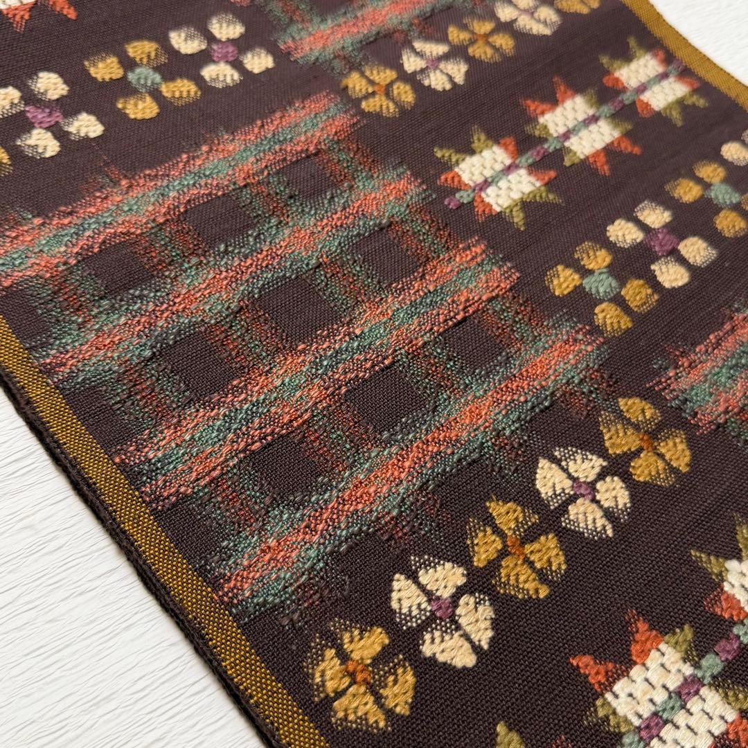 帯屋捨松 謹製 \"スウェーデン裂文\" 名古屋帯 正絹