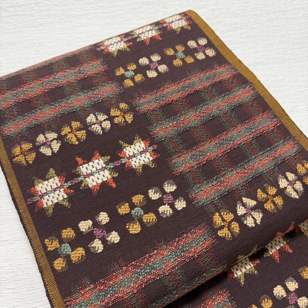 帯屋捨松 謹製 \"スウェーデン裂文\" 名古屋帯 正絹