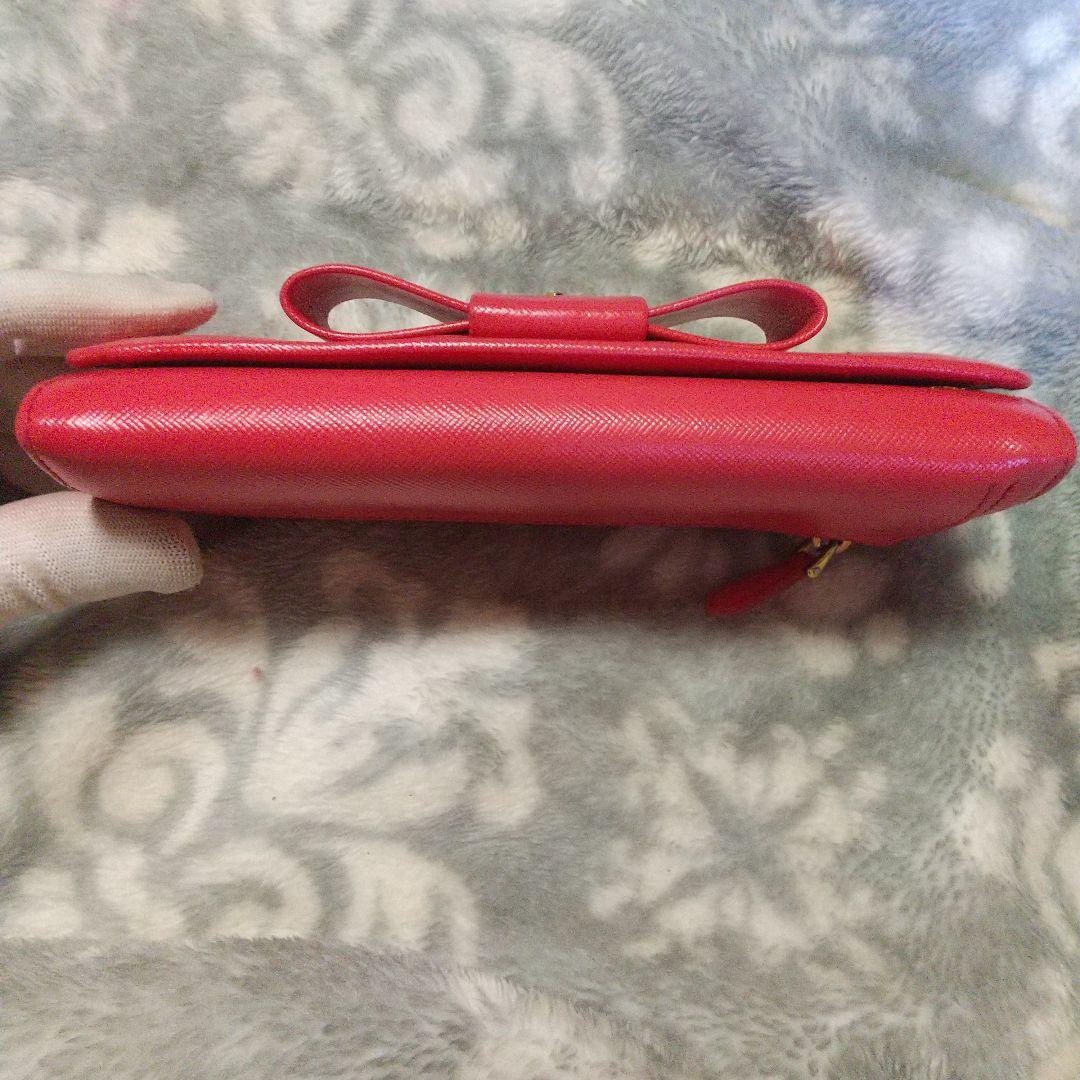 PRADAサフィアーノ リボン付き 長財布オレンジ系