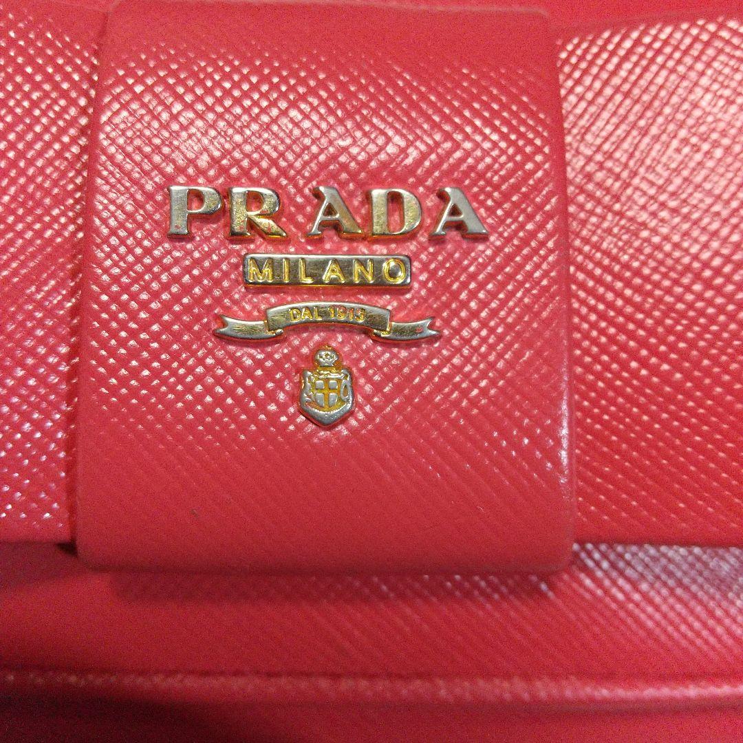 PRADAサフィアーノ リボン付き 長財布オレンジ系