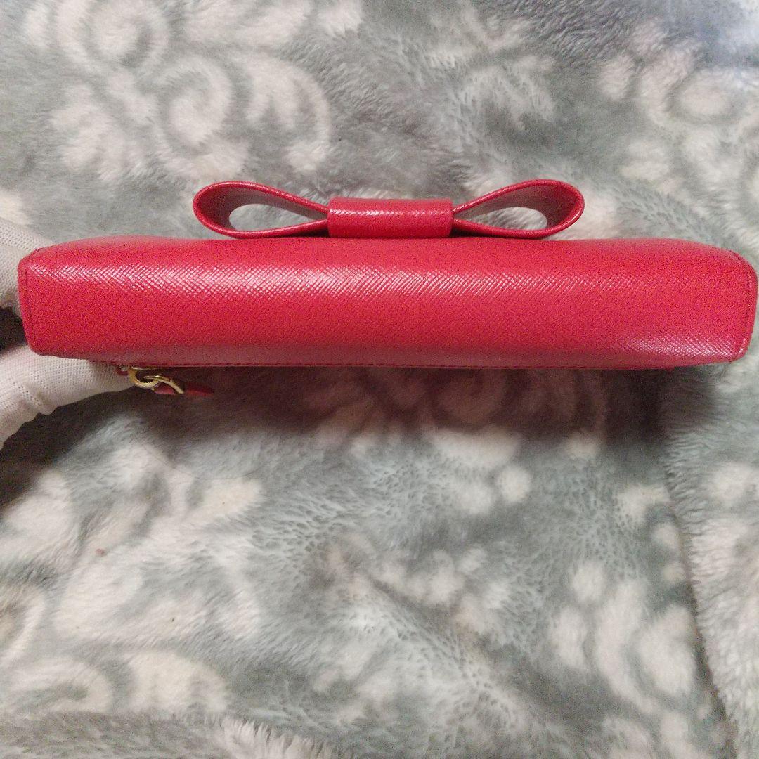 PRADAサフィアーノ リボン付き 長財布オレンジ系