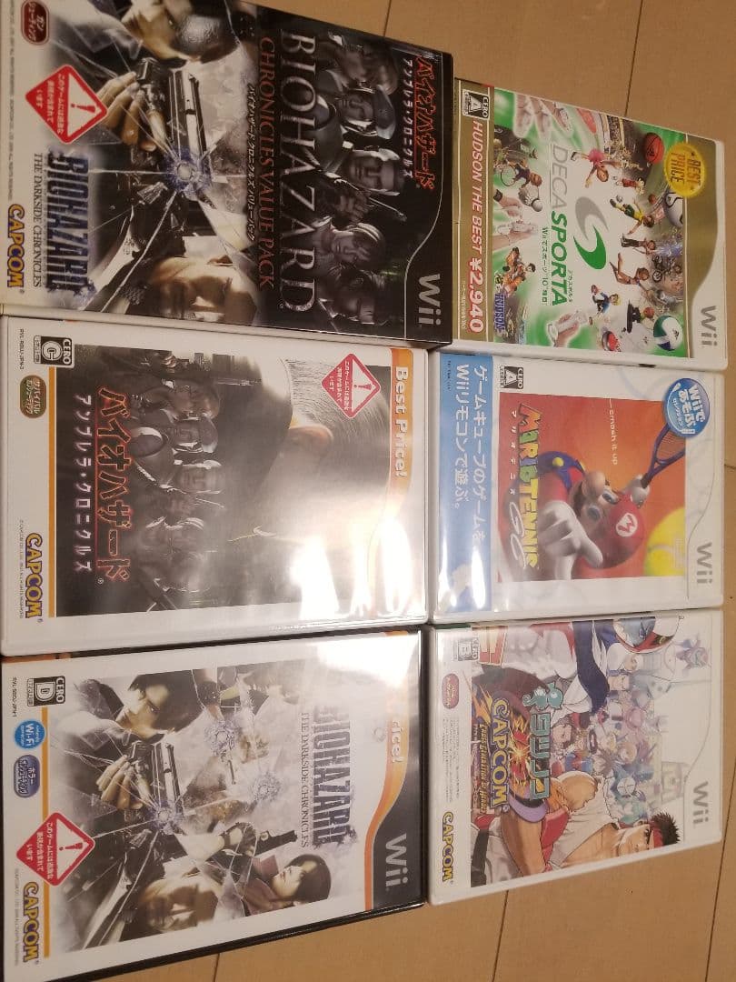 Wii 本体一式、ソフト4作品、コントローラー、ヌンチャク、周辺機器ガイド