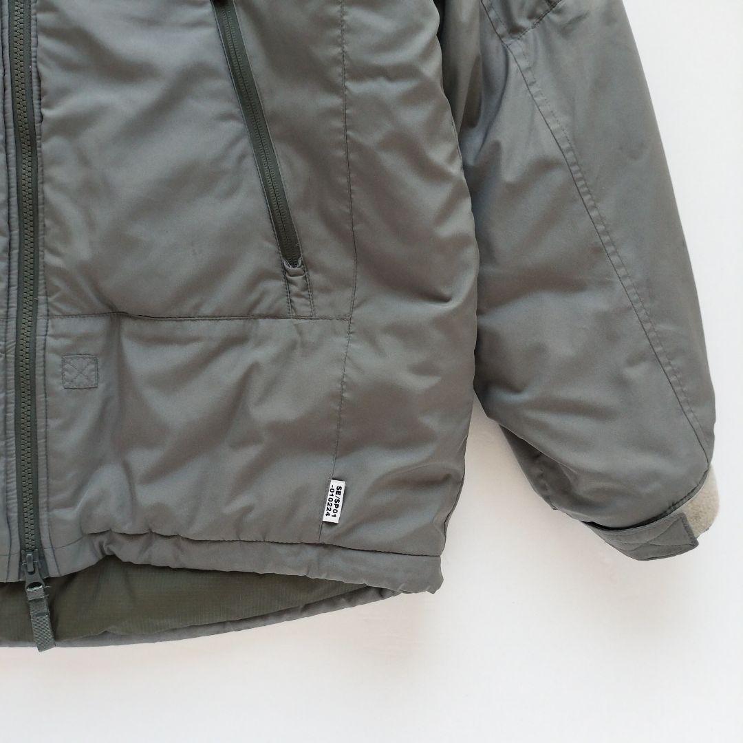 ディスイズネバーザット シンサレート ミリタリージャケット カーキ 【Ｌ相当】