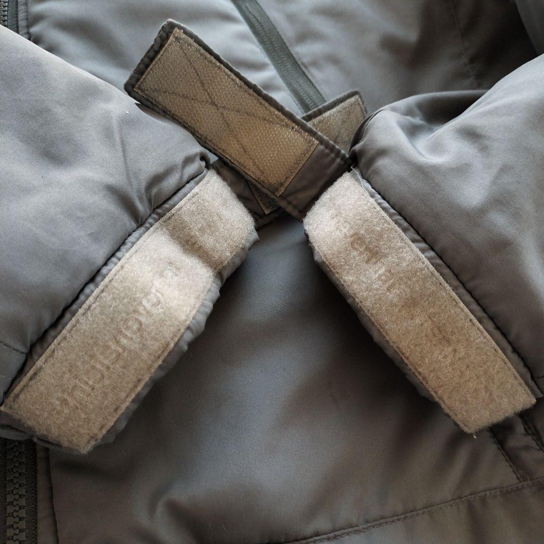 ディスイズネバーザット シンサレート ミリタリージャケット カーキ 【Ｌ相当】