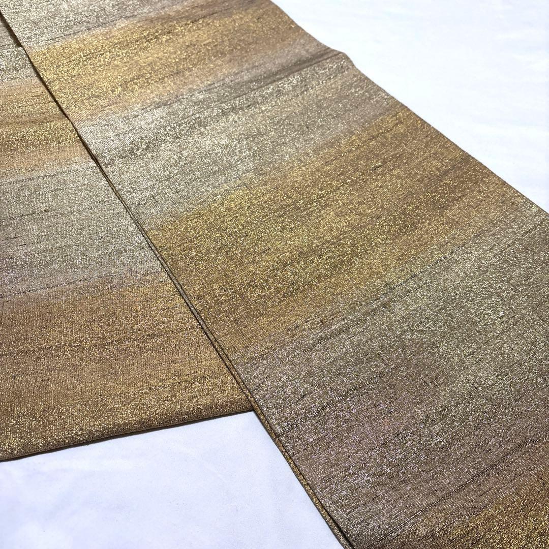 袋帯【桝屋高尾】ねん金綴錦 西陣織 正絹 全通柄 段霞紋 着物帯 金銀糸 共箱付