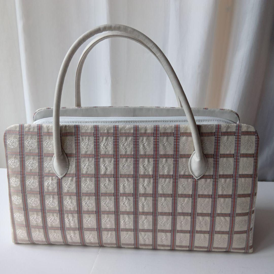 西陣織利休バック　ベージュとレッドの格子柄和装用バッグ