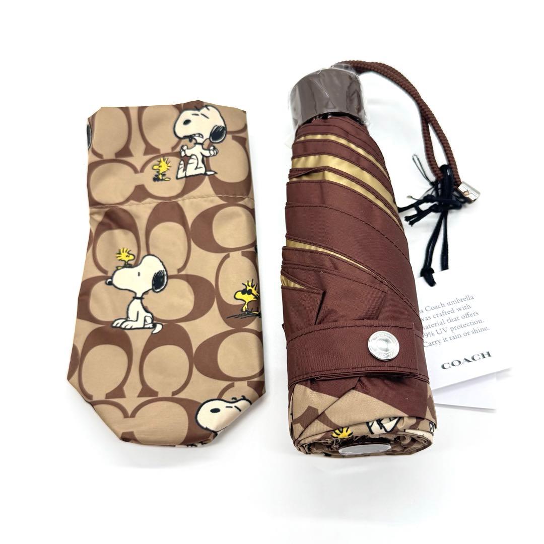 【新品】COACH x PEANUTS スヌーピ折りたたみ傘 ブラウン 品薄