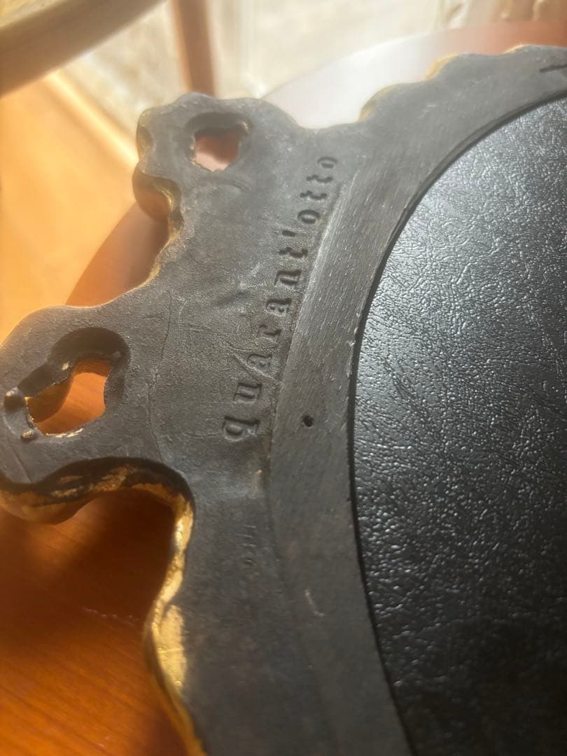 クアラントットノベルティミラー黒と金のリボン装飾