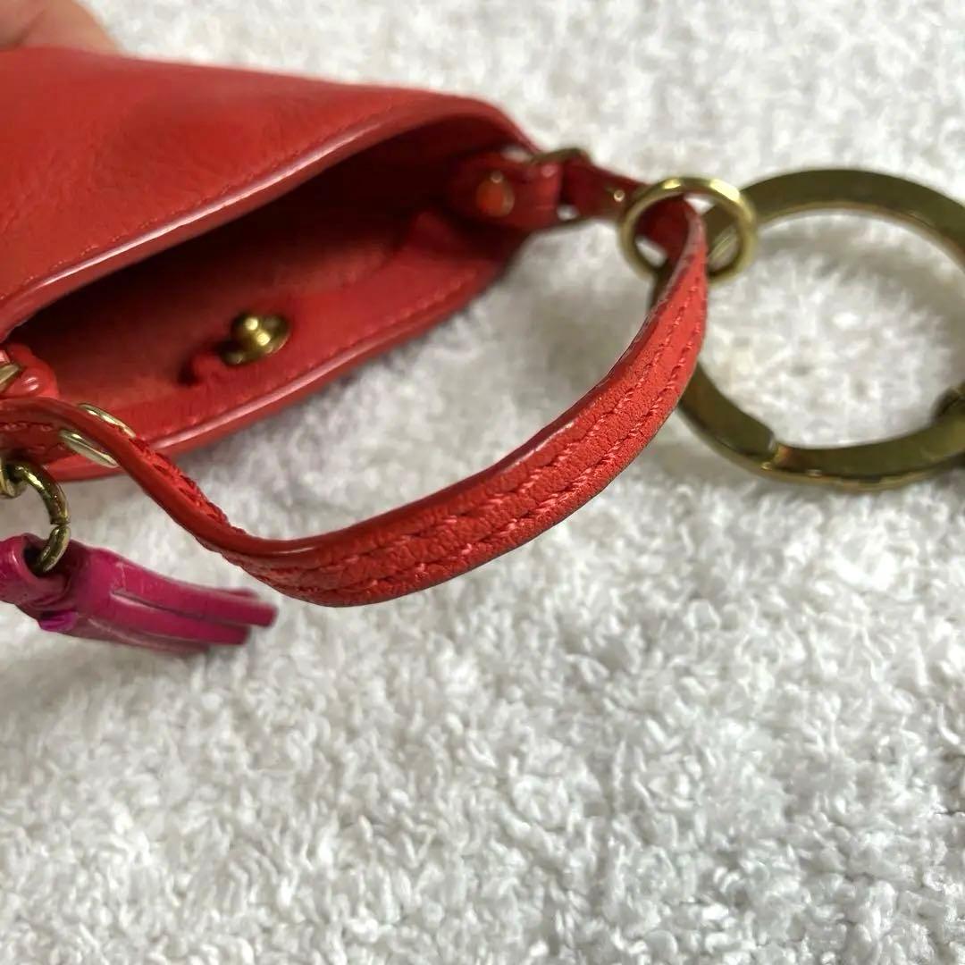 コーチ　レザー レッド ミニ小物入れ　タッセル付き　キーチャーム
