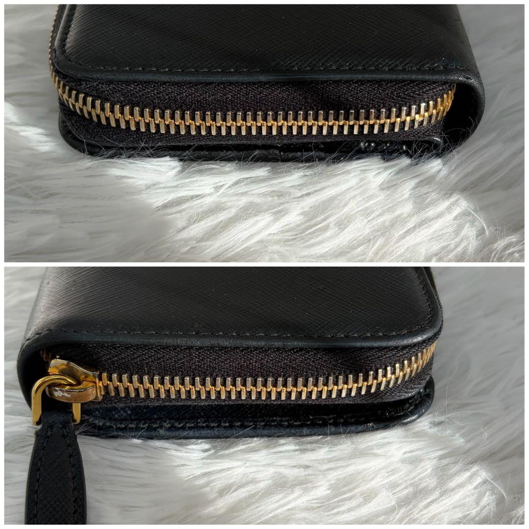 美品✨プラダ　二つ折り　金ロゴ　サフィアーノ　ラウンドファスナー　レザー　黒