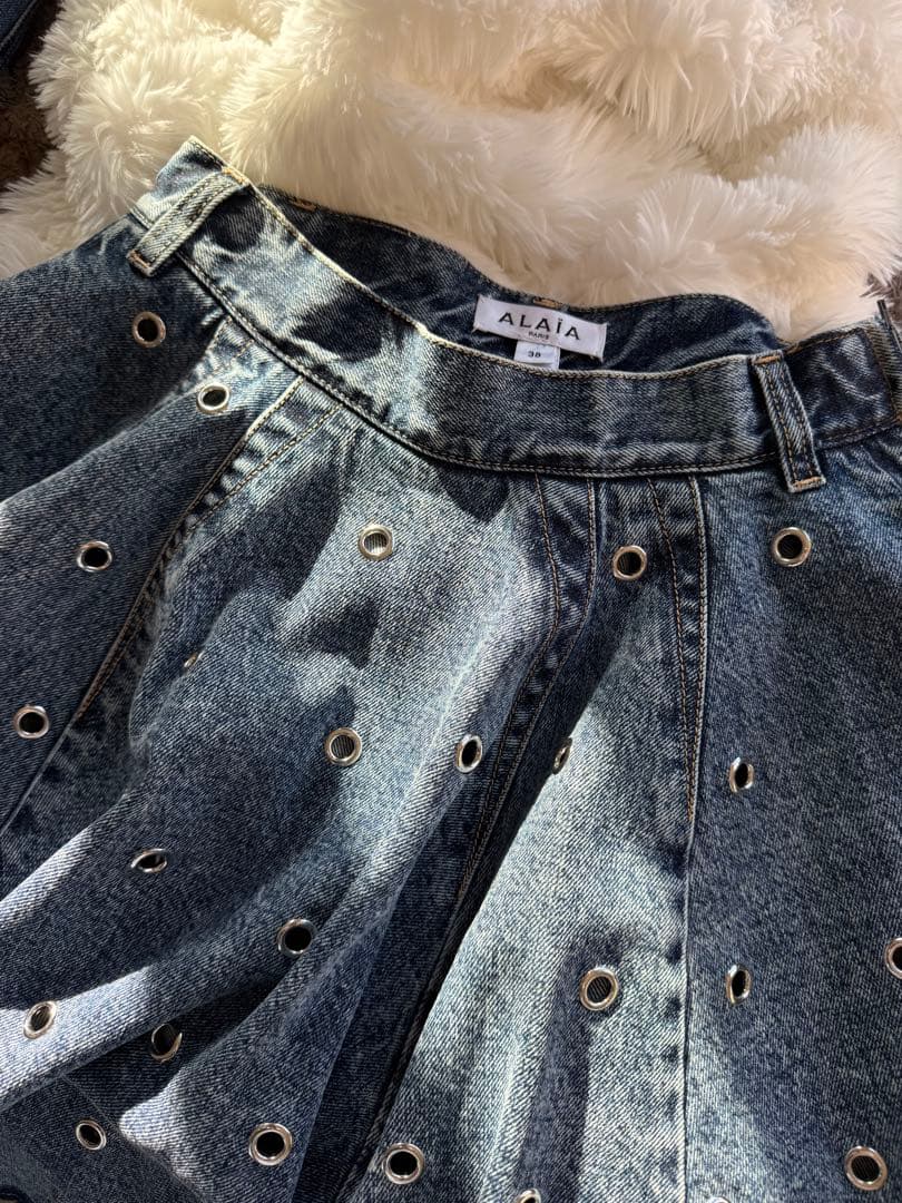 ゆ*ん様 セールAlaia アライア20万超デニム アイレット フレアスカート