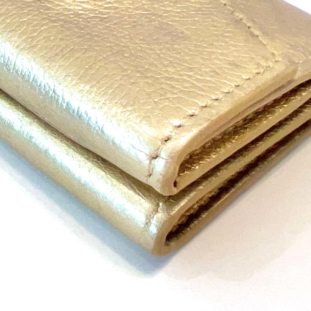 ルイヴィトン ポルトフォイユ ロックミニ 折り財布 ゴールド M69059