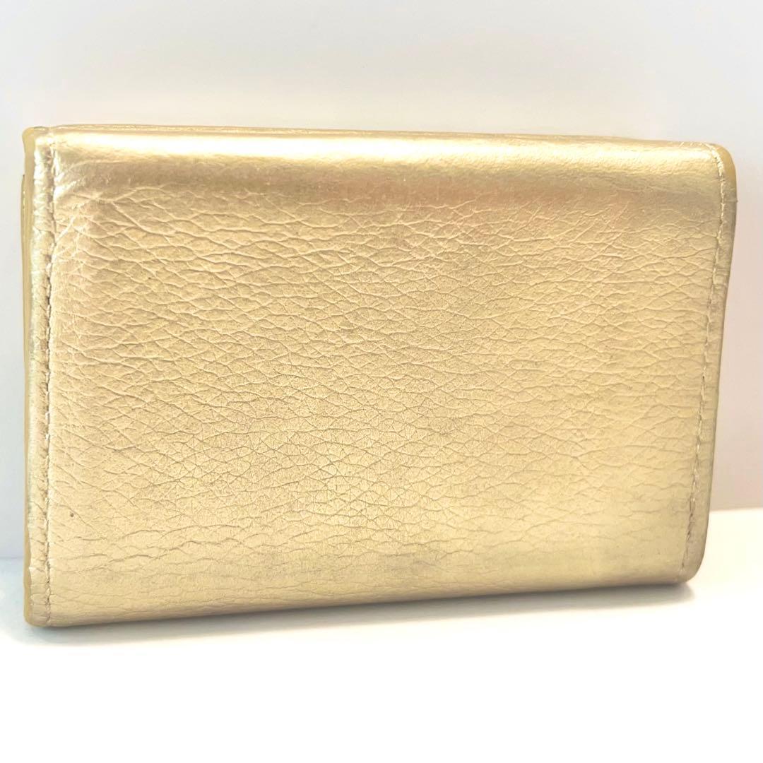 ルイヴィトン ポルトフォイユ ロックミニ 折り財布 ゴールド M69059