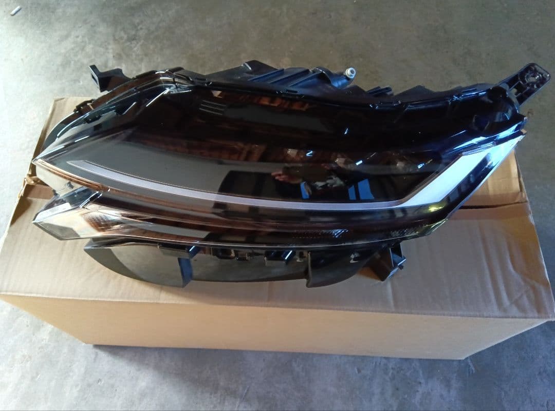 日産 ノート オーラ 純正 左ヘッドライト ICHIKOH 1994