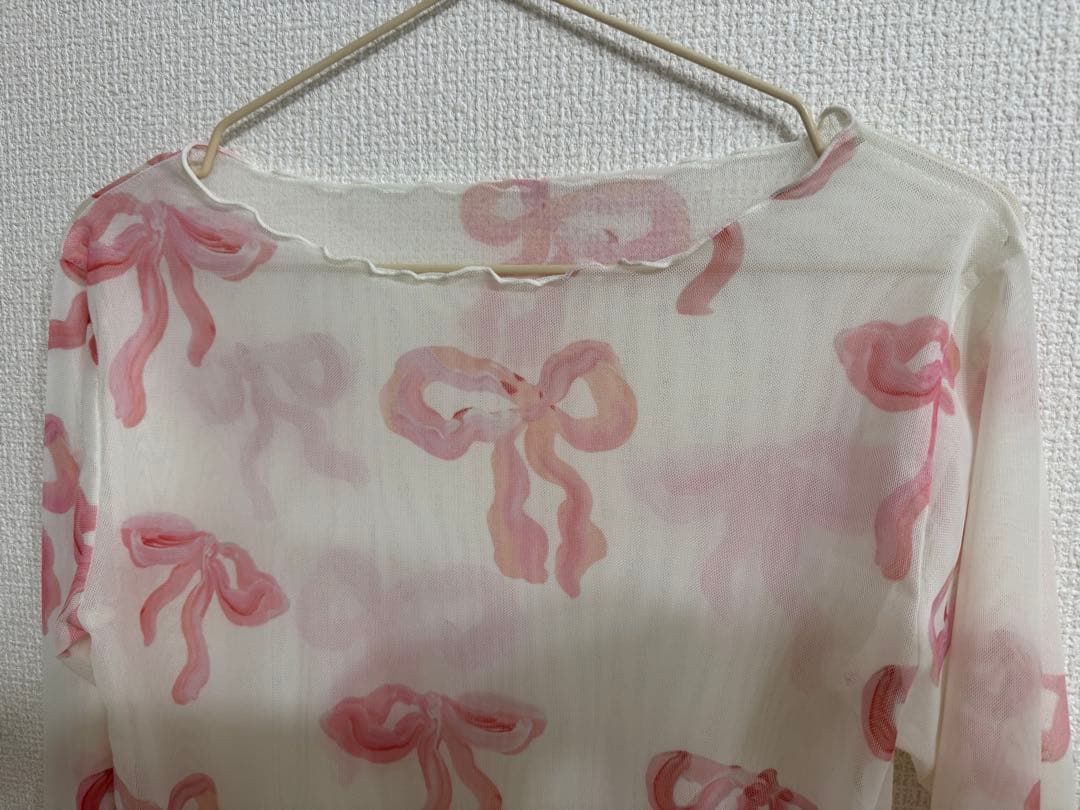 poppy シースルートップス　ピンクリボン