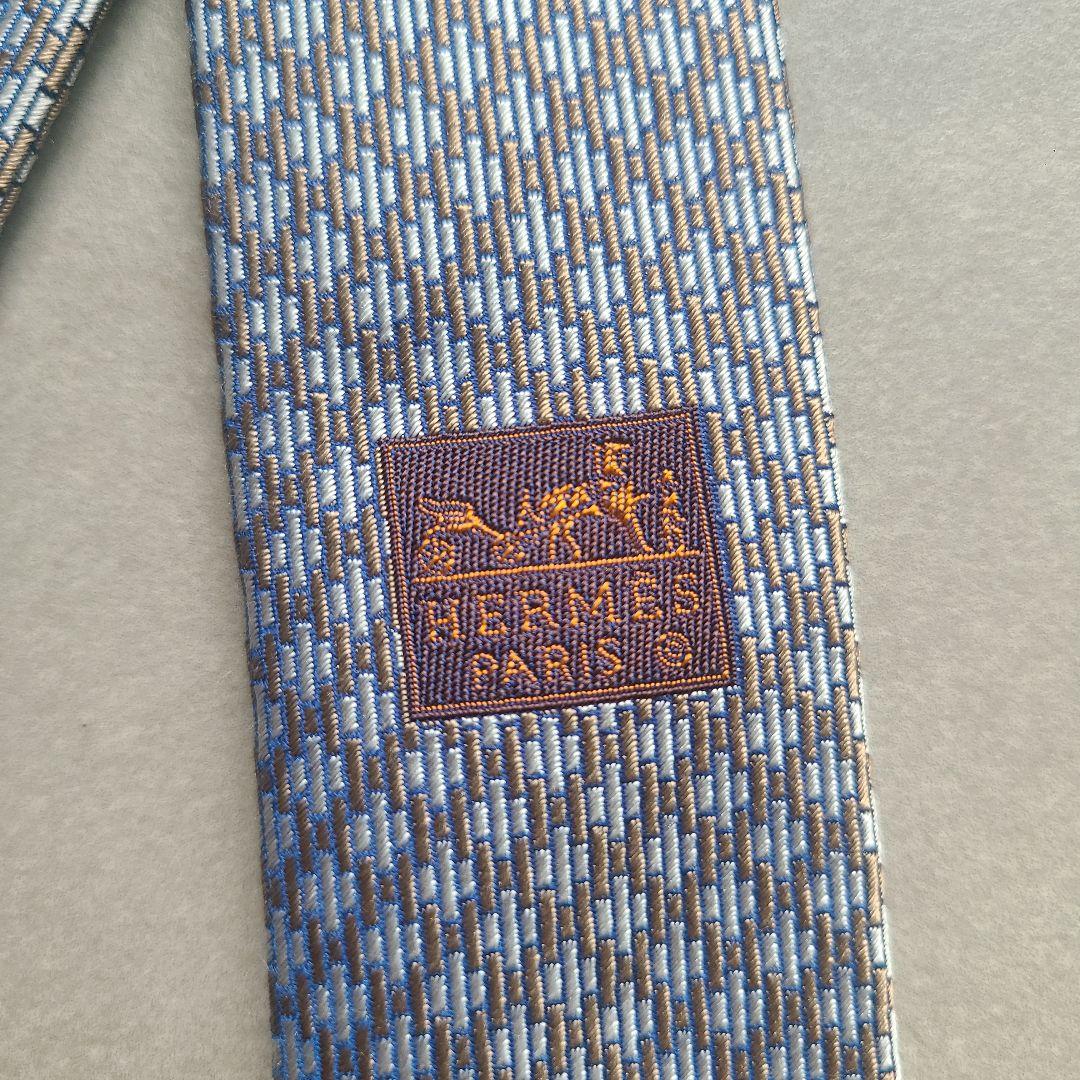HERMES 青と茶色のチェック柄ネクタイ