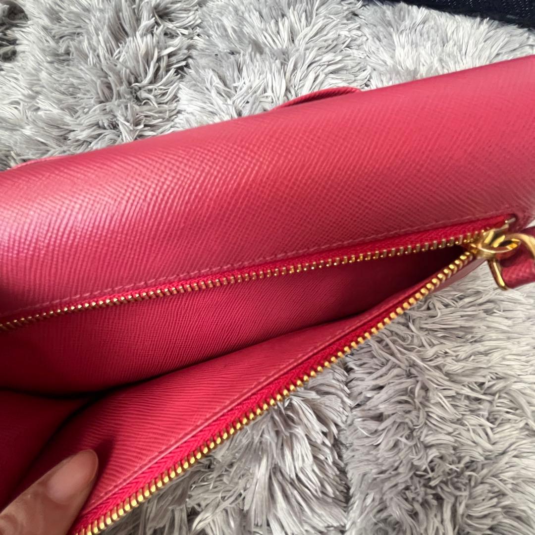 良品✨PRADA フィオッコ　サフィアーノ　メタルロゴ　リボン　ピンク　長財布