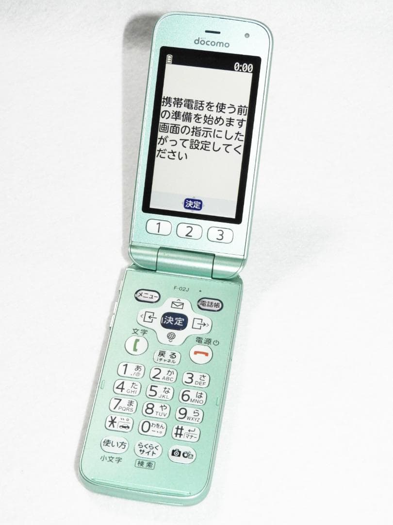 富士通 らくらくホン F-02J グリーン docomo ガラホ 4G LTE