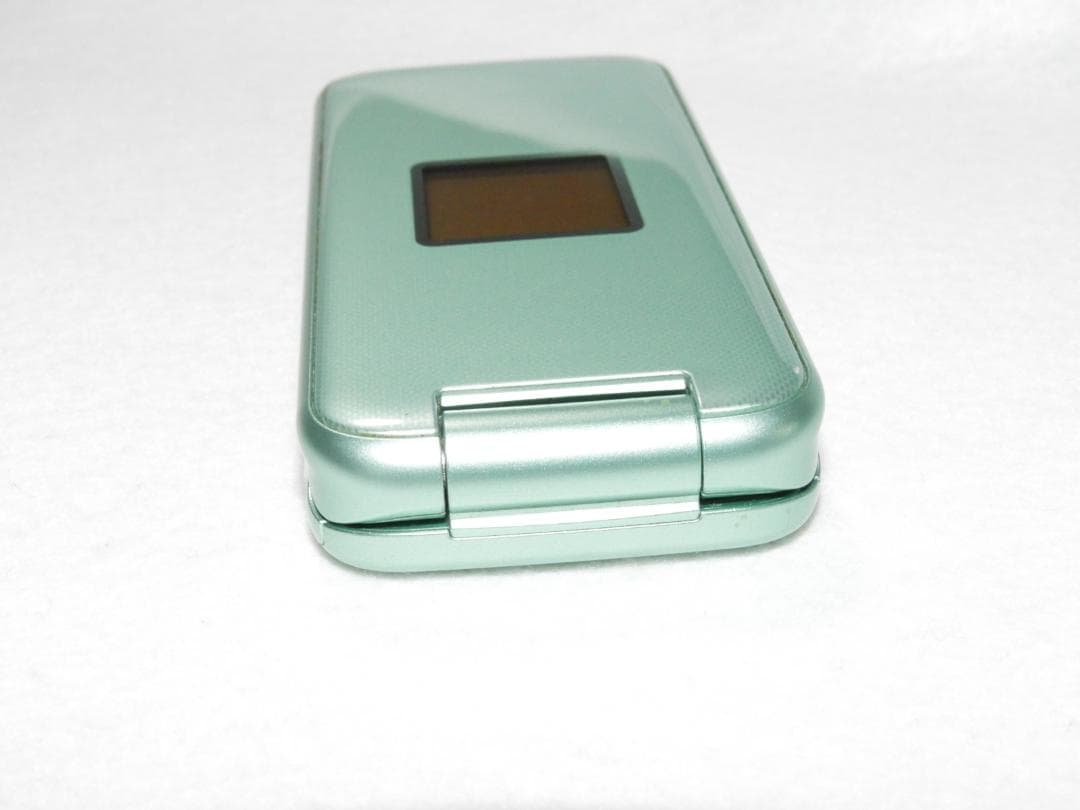 富士通 らくらくホン F-02J グリーン docomo ガラホ 4G LTE