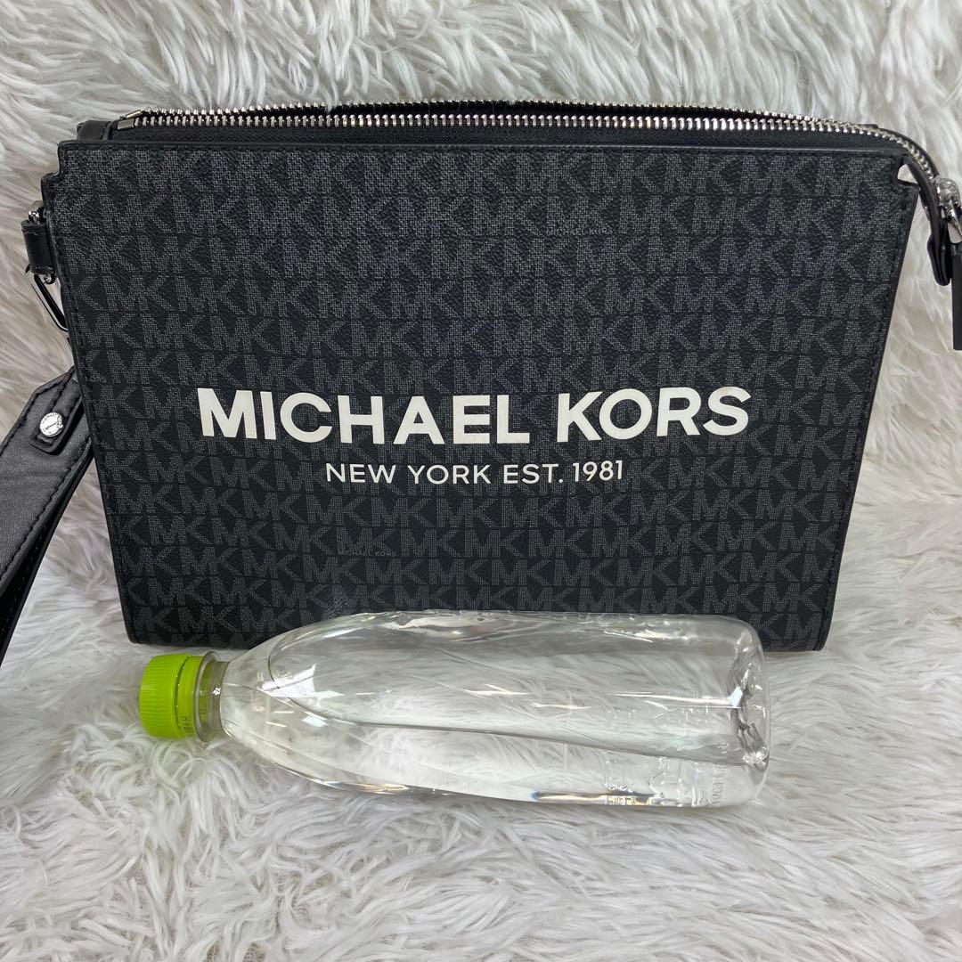 【美品】マイケルコース ロゴ　MK柄　黒　バッグ クラッチバッグ 男女