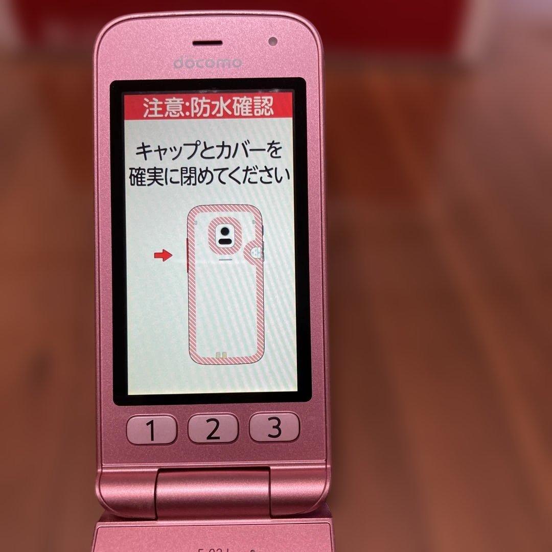 docomo F-02J ピンク 携帯電話 本体 中古