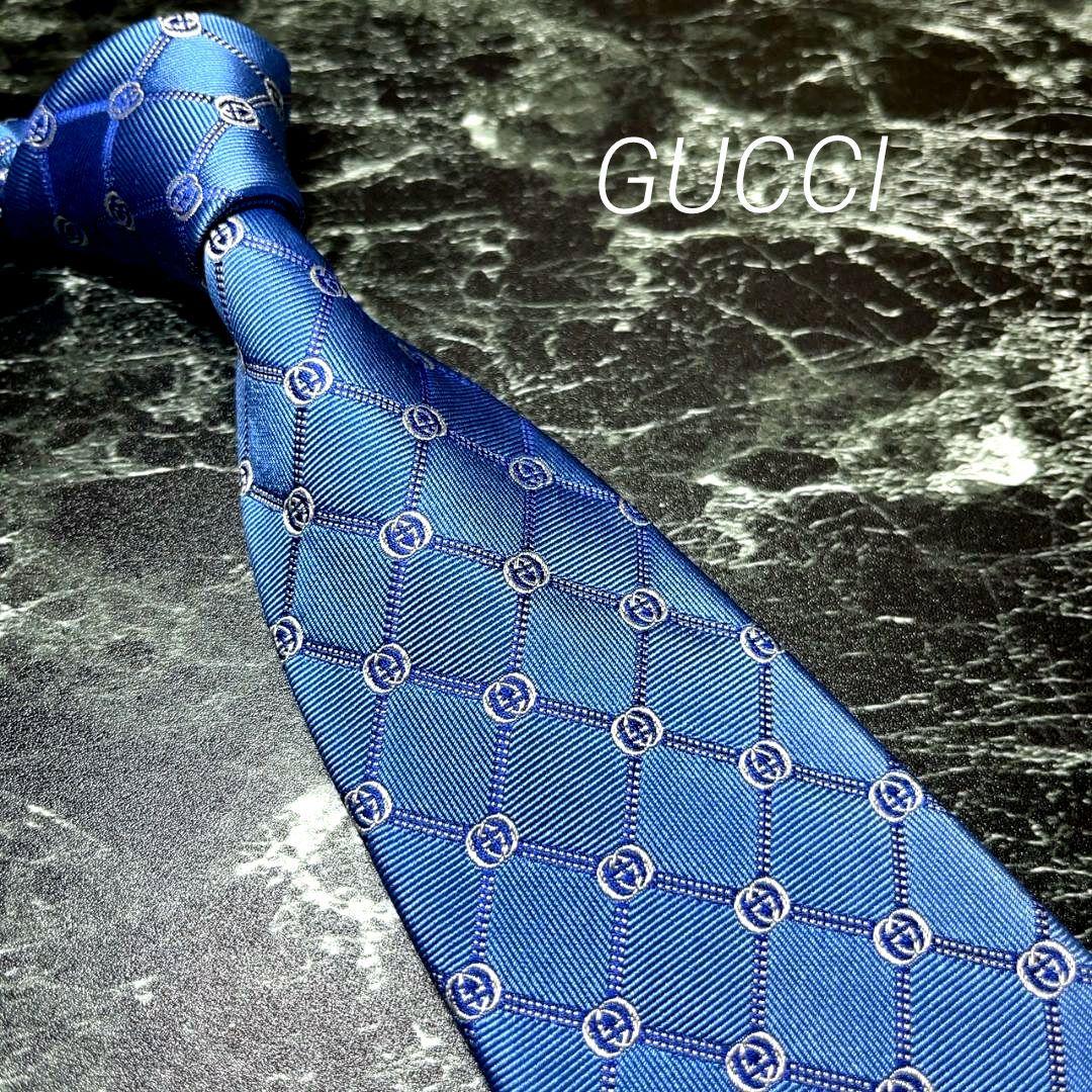 GUCCI グッチロゴ入りブルー系ネクタイ インターロイキング