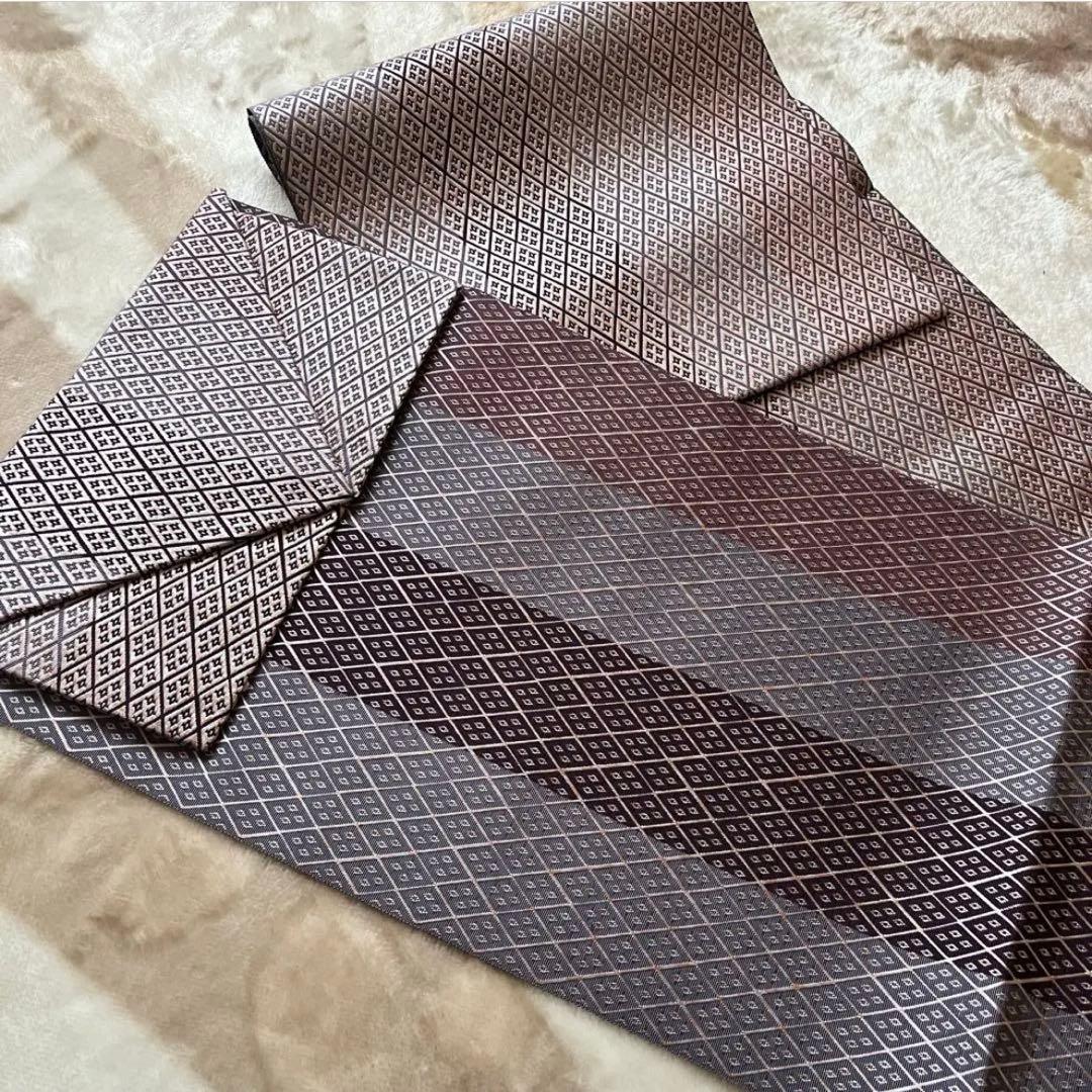 未使用　博多織　名古屋帯　正倉院　菱紋　伝統工芸士　松浦長治　証紙あり