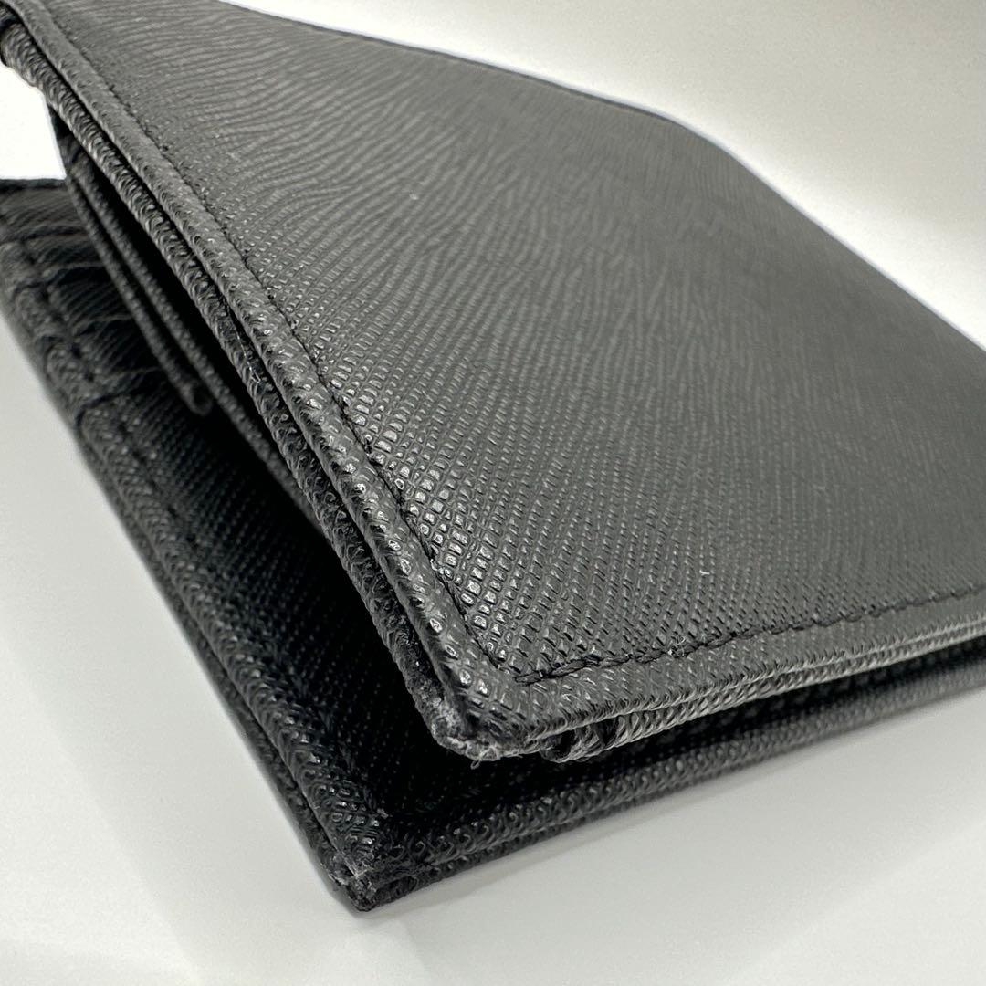 エンポリオ・アルマーニ(EMPORIO ARMANI) 2つ折り財布 ロゴ型押し