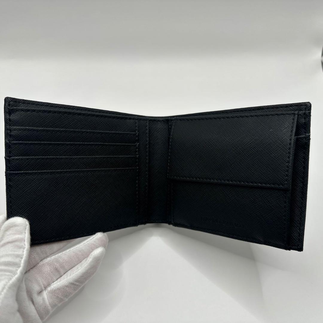 エンポリオ・アルマーニ(EMPORIO ARMANI) 2つ折り財布 ロゴ型押し