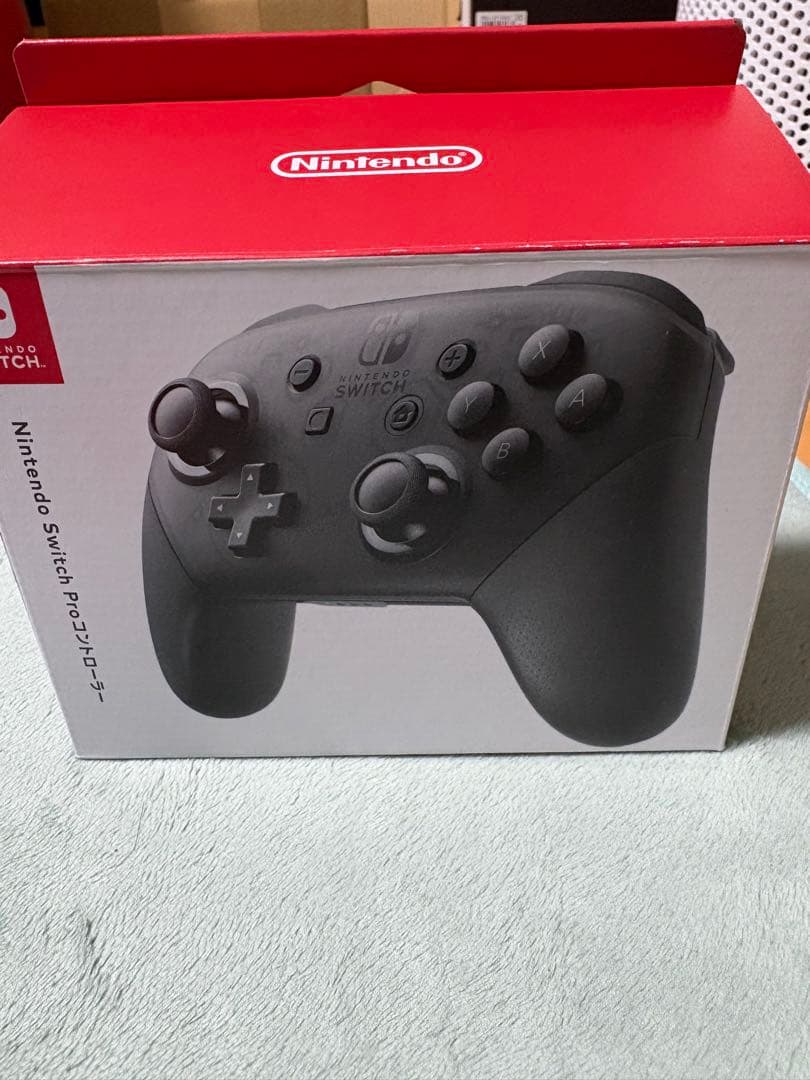 Nintendo Switch本体＋ソフト二種＋プロコン『初期化済・付属品完備』