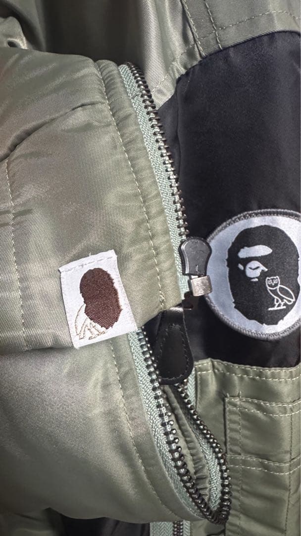 発*す様 22AW BAPE×OVO LOOSE FIT MA-1 OLIVE