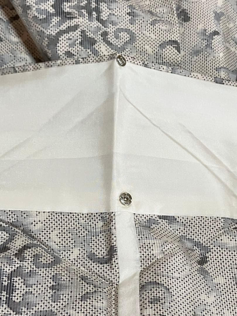 白大島 本場大島紬 経緯絣 単衣 小紋 唐草 居敷当て 美品 イ6628