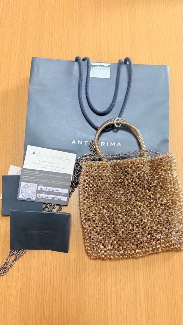 ANTERIMA ゴールドビーズショルダーバッグ