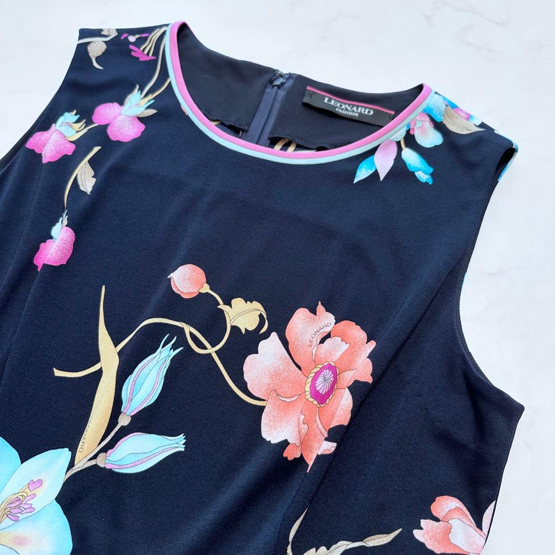 現行タグ XL相当✨レオナール カンカン素材 ペプラム トリム 花柄 黒 42