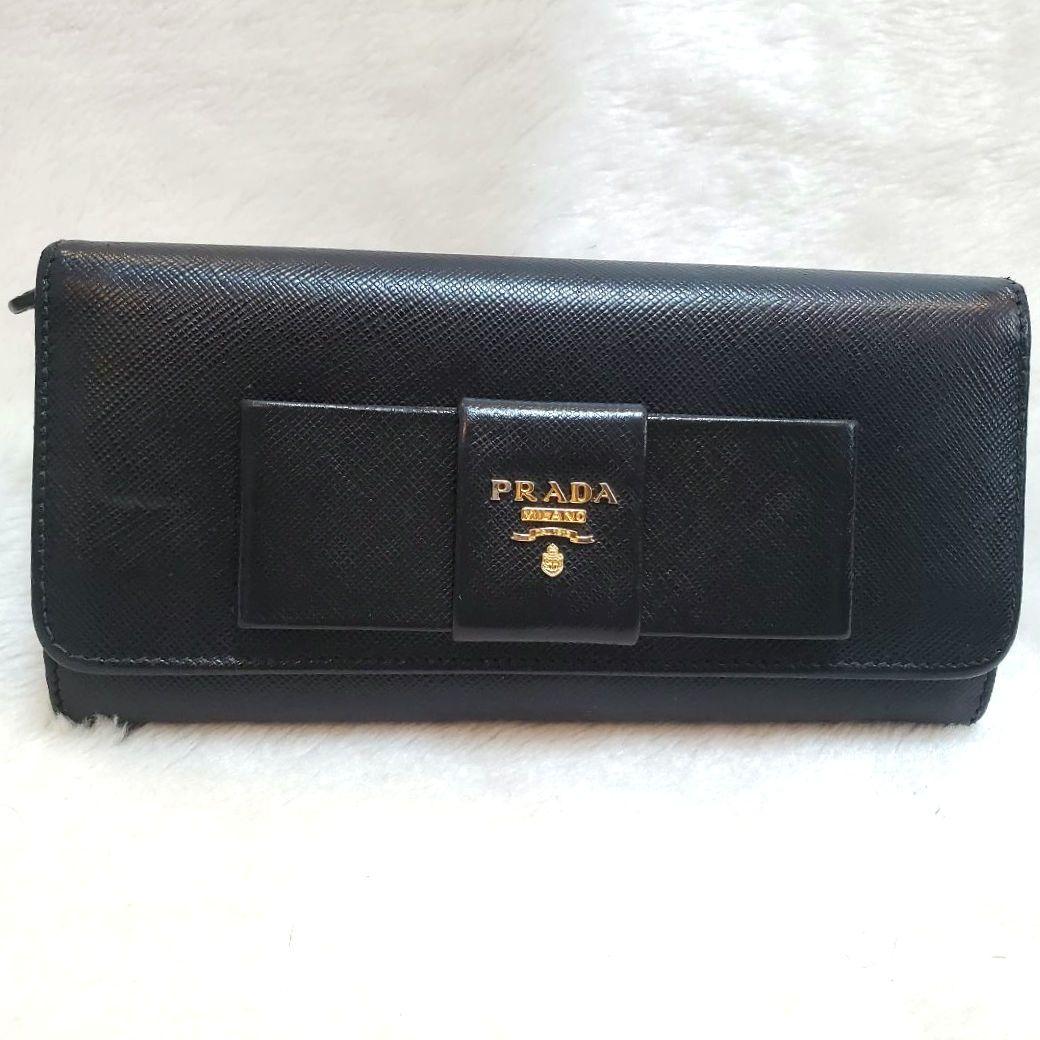 美品 プラダ　長財布 サフィアーノ フィオッコ ライト黒 メタルロゴ リボン