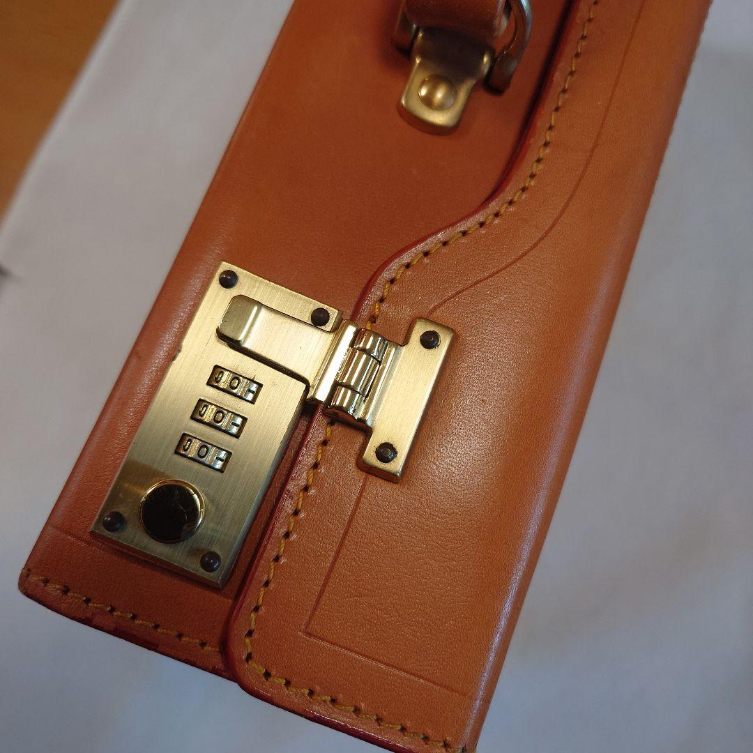 FIVEWOODSオレンジ レザービジネスバッグ（保管袋付き：PRADA）