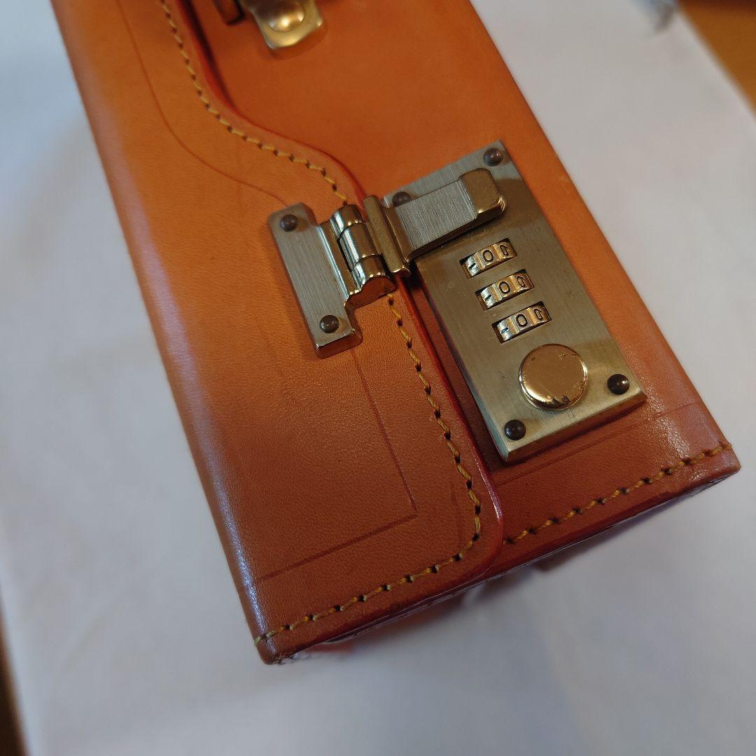 FIVEWOODSオレンジ レザービジネスバッグ（保管袋付き：PRADA）