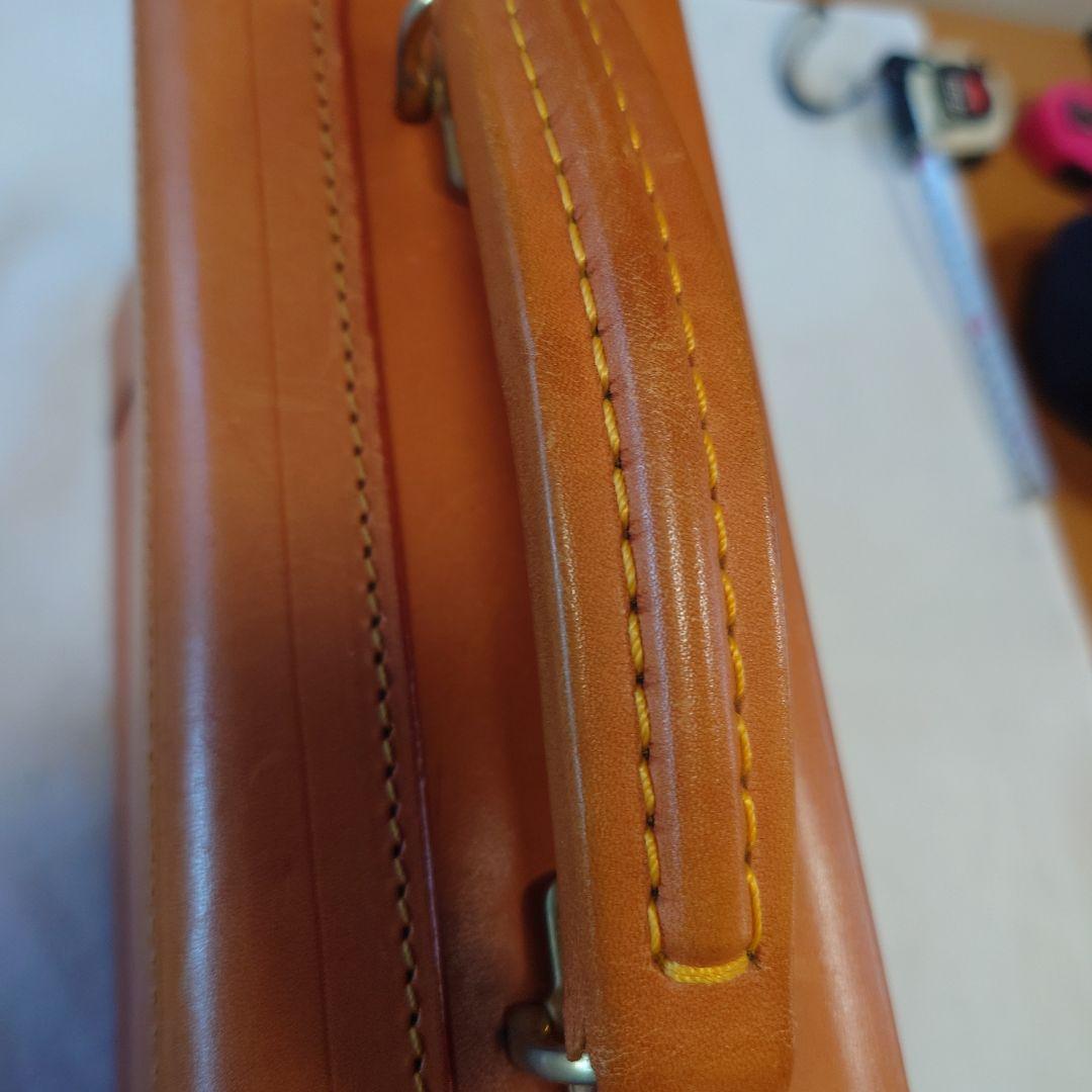 FIVEWOODSオレンジ レザービジネスバッグ（保管袋付き：PRADA）