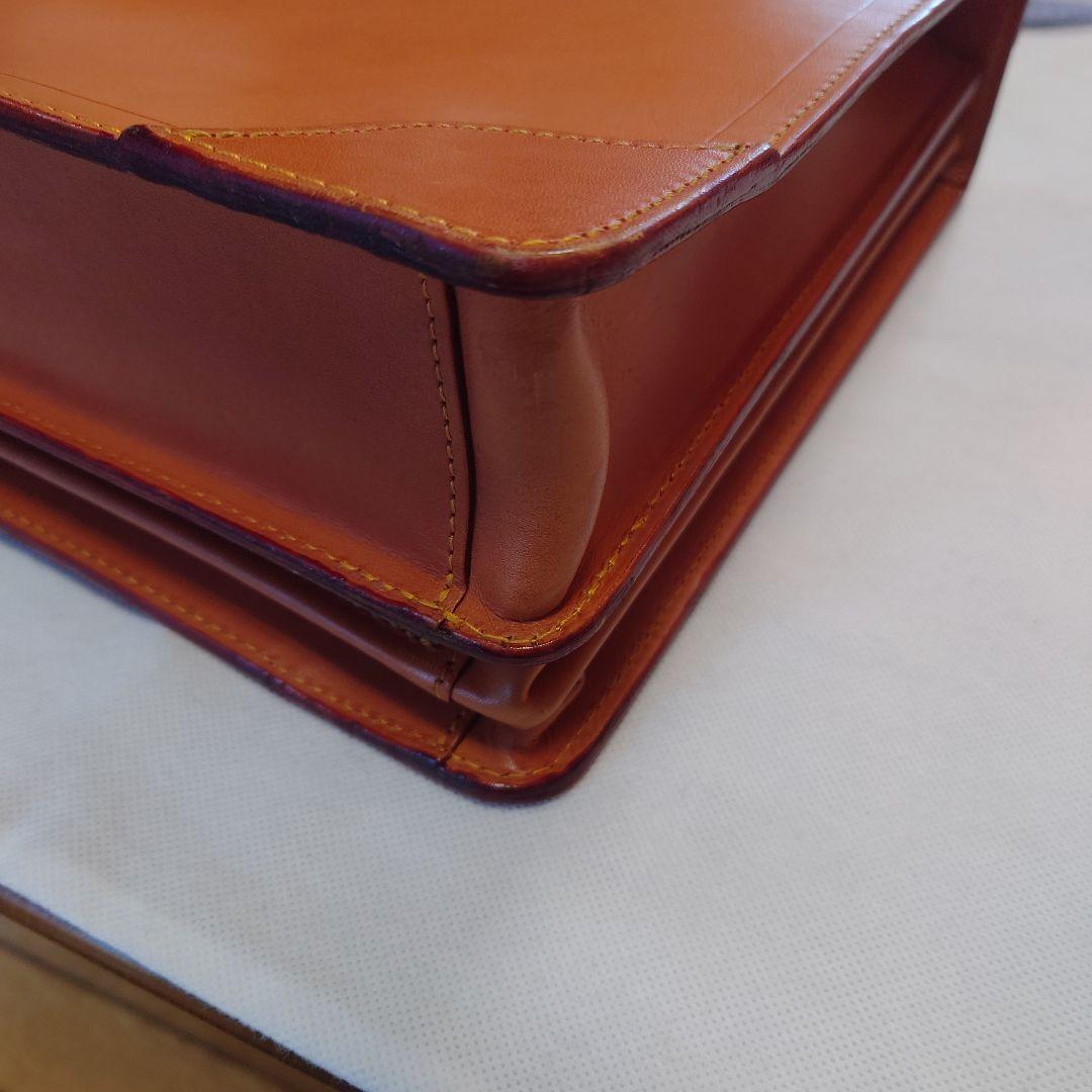 FIVEWOODSオレンジ レザービジネスバッグ（保管袋付き：PRADA）