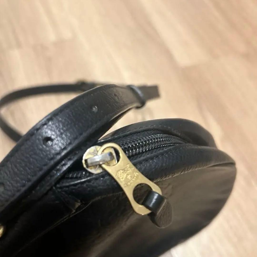 イルビゾンテ ブラックレザーショルダーバッグ ラウンド