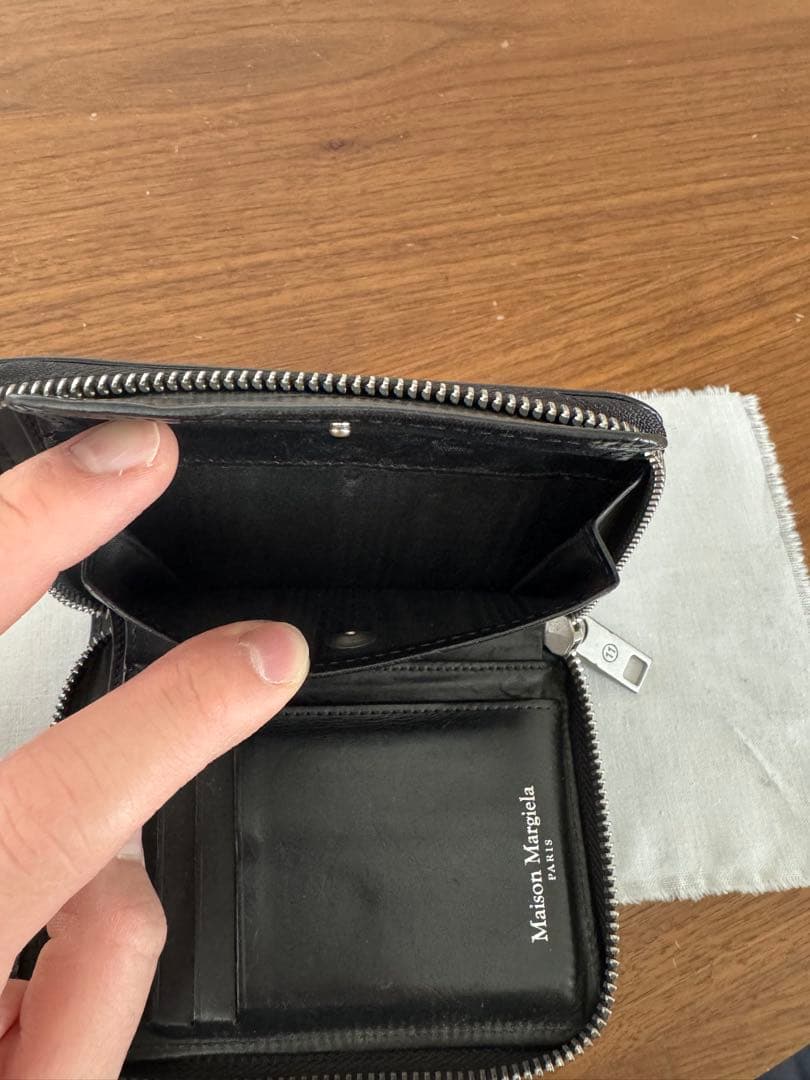 マルジェラ ラウンドジップ折り財布 なりた