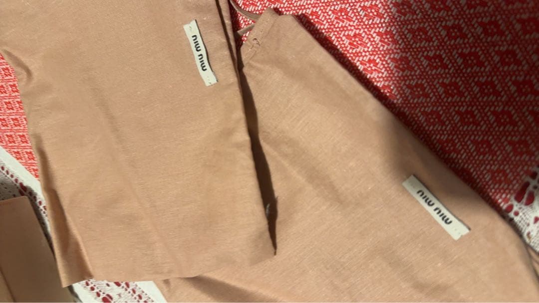 miumiu 羽根付きシューズ