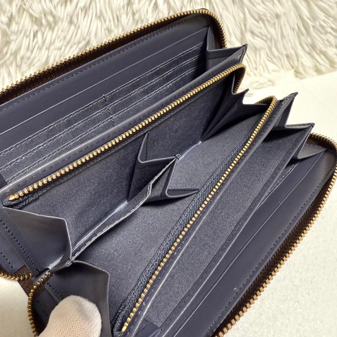 未使用 ラシット モノグラム プレート ラウンドジップ ウォレット 長財布