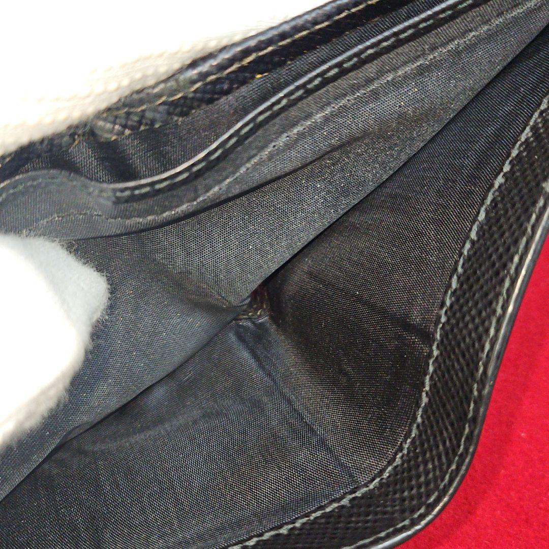 PRADA プラダ 折り財布 三角プレート ロゴ金具 サフィアーノレザー 黒