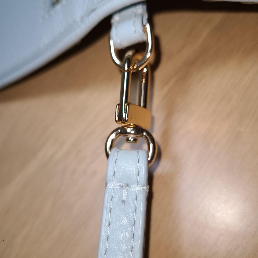 トリーバーチ　スマホ携帯クラッチバッグ