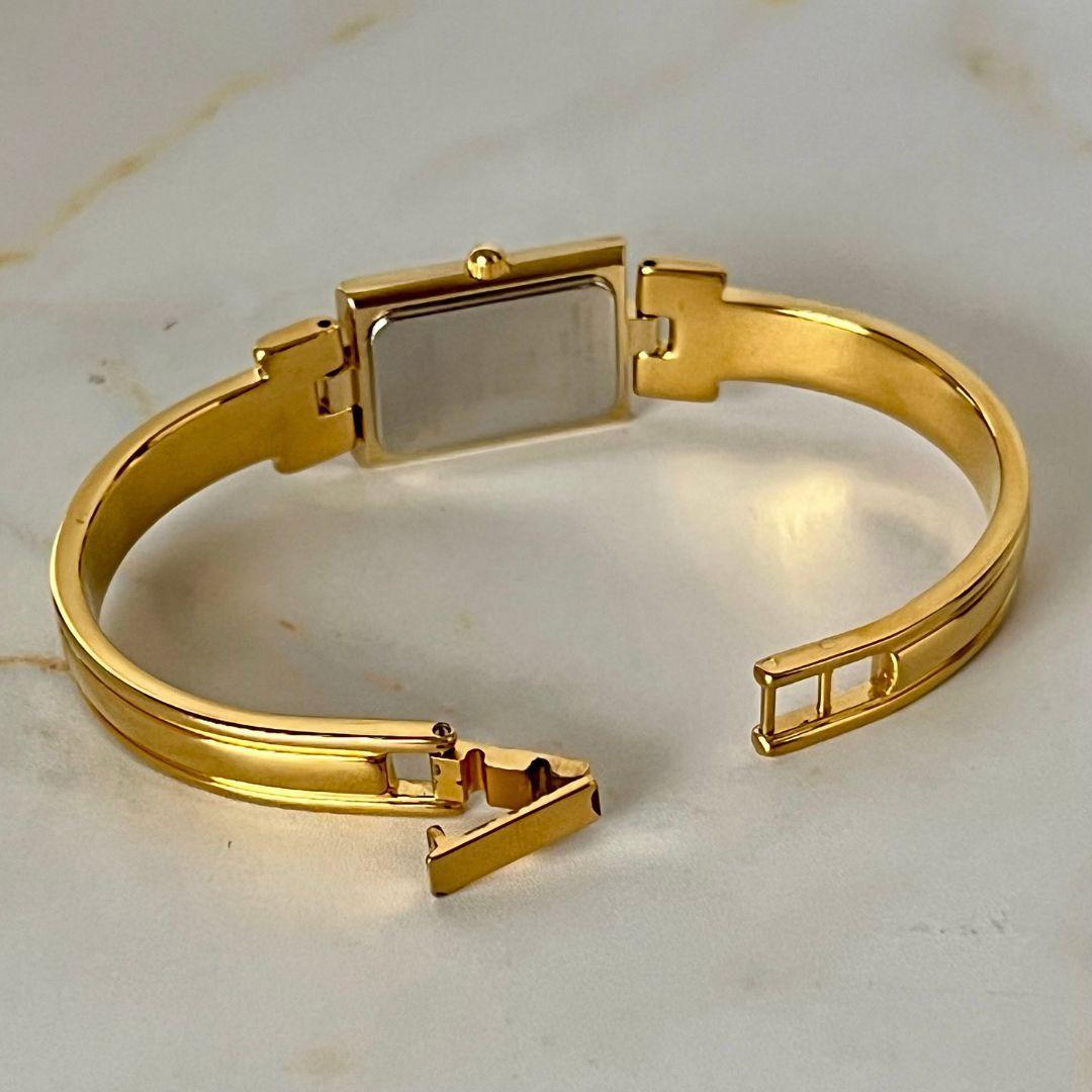 【稼働品】GIVENCHY レディース 腕時計 12Pダイヤ バングル クォーツ