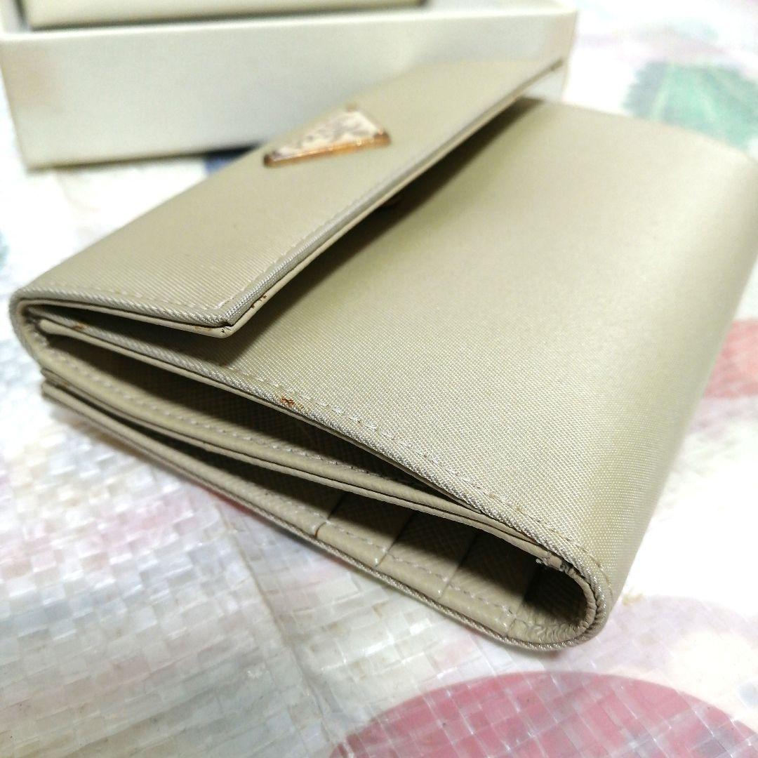 【未使用美品】 PRADA 三つ折り財布 テスート ゴールド ベージュ 三角ロゴ