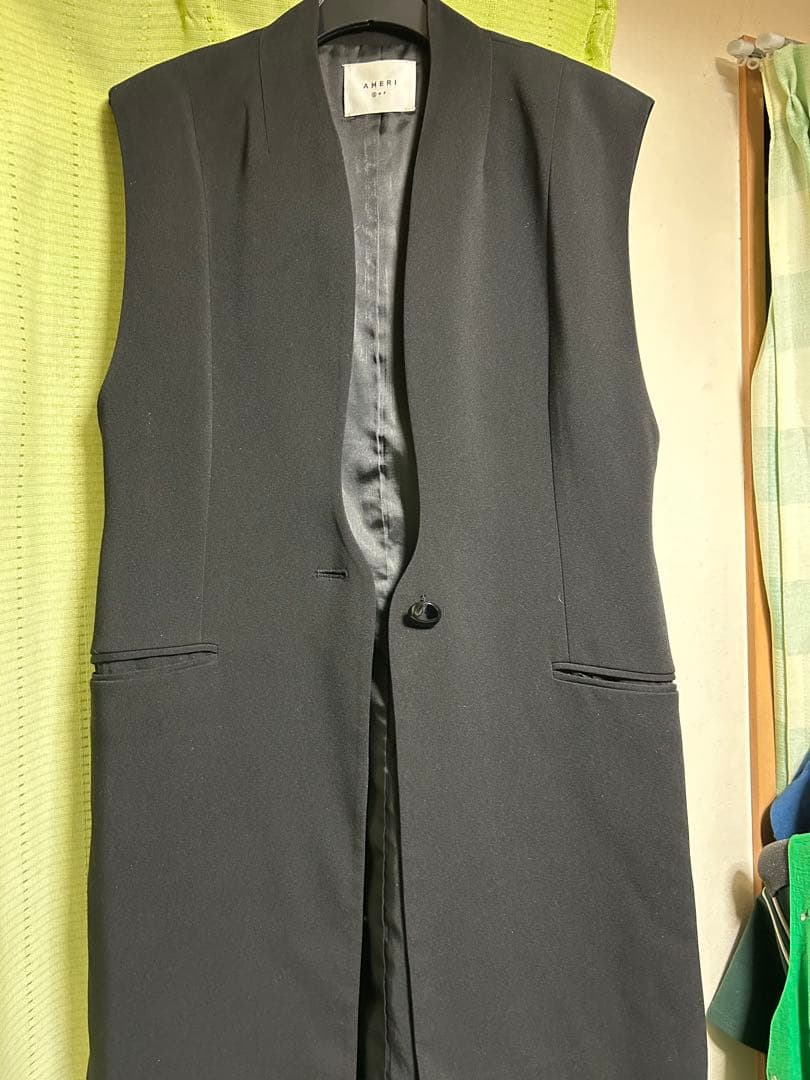 トップス WAVE COLLAR ANGULAR VEST