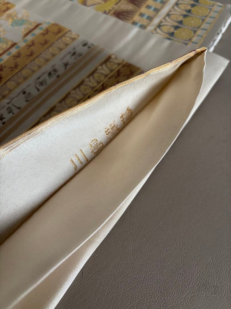 川島織物 アイボリー インカ文様 六通柄 本袋帯